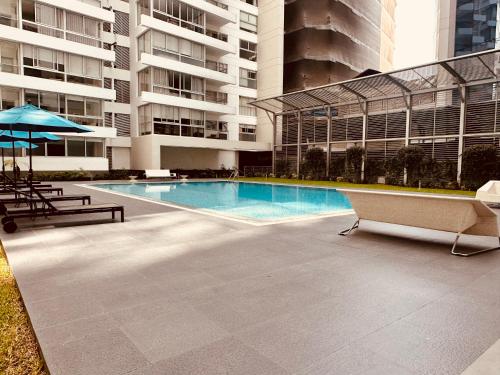 a swimming pool in the middle of a building at SKY OF MOON in Lima