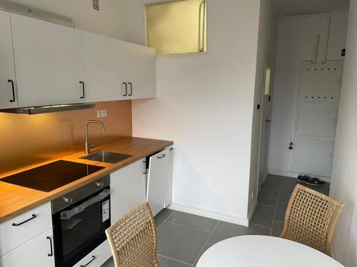 Kuchyň nebo kuchyňský kout v ubytování Apartament Piesza