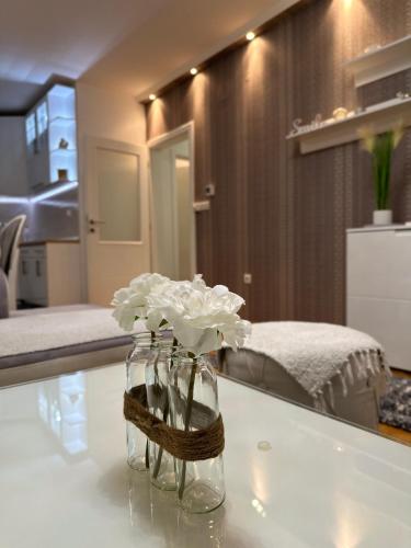 Katil atau katil-katil dalam bilik di Central Luxury Suites