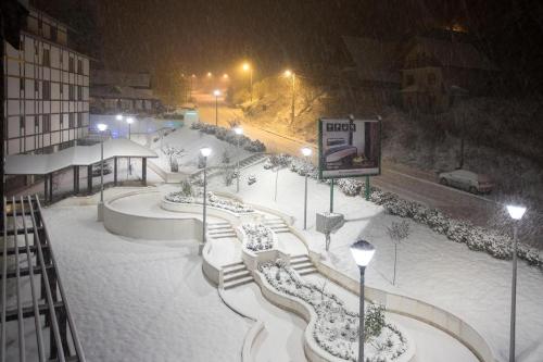 a skate park covered in snow at night at Apartman DUSA in Kopaonik