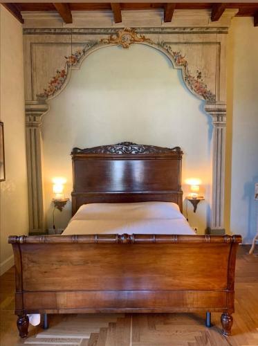 Letto o letti in una camera di B&B Dimora Delle Donnole Bergamo Alta