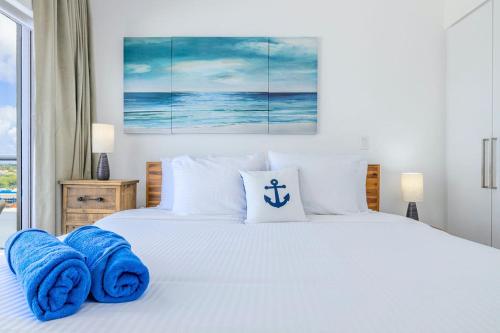 Postel nebo postele na pokoji v ubytování Hh-2Bstd614 - All Shades Of Blue Oceanfront Luxury Condo