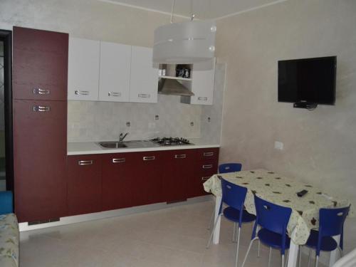 Kuchyň nebo kuchyňský kout v ubytování Apartment Difesa Pizzo