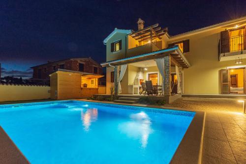 Gallery image of Villa David - luxurious secluded villa with a heated pool in Butkovići