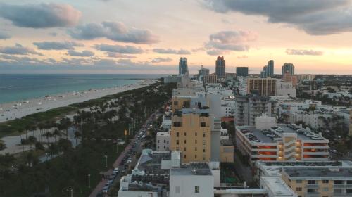 an aerial view of a city and the beach at The Julia Hotel in Miami Beach