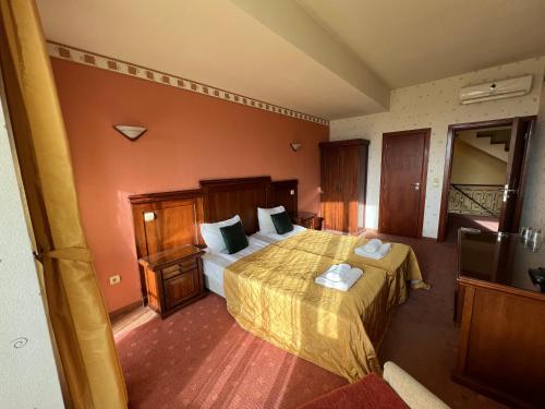 Katil atau katil-katil dalam bilik di HOTEL BOLYARI