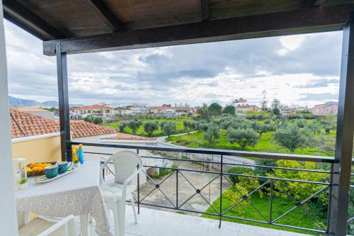 a view from the balcony of a house at Sarita's Apartments & Suite in Laganas
