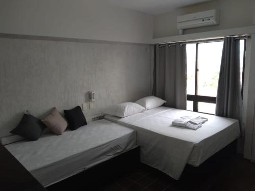 Postel nebo postele na pokoji v ubytování Flat na praia de iracema 504