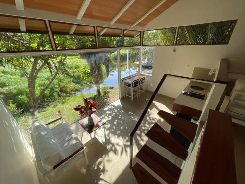 a view of a living room with a view of a house at Lagoon Village B&B y SPA in Tarapoto