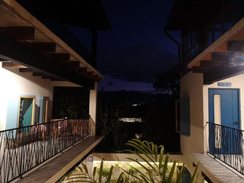 a view from the balcony of a house at night at Hotel Pepen in San Cristóbal de Las Casas