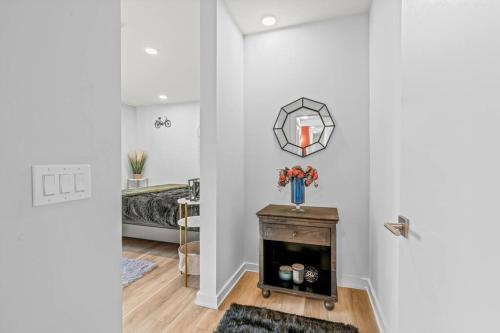 a living room with a fireplace and a bedroom at Pure Relaxation-Luxury/Roof Top* in Philadelphia