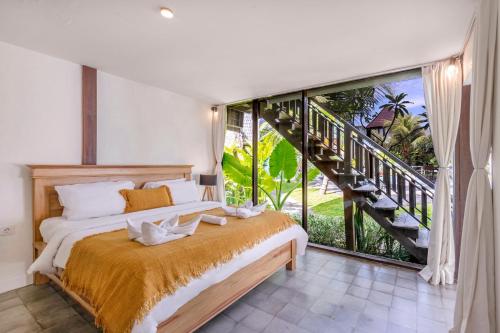 Llit o llits en una habitació de BB Garden Resort