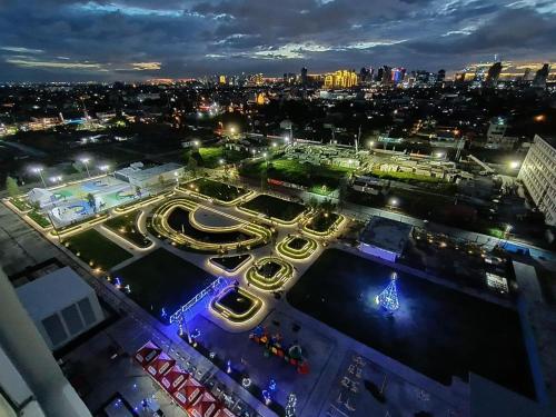 an aerial view of a city at night at Staycation in Pasig Love Never Fails in Manila