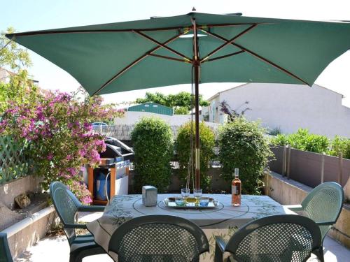 Maison familiale climatisée, 6 couchages, proche plage et centre, terrasse, parking privé - FR-1-229D-79