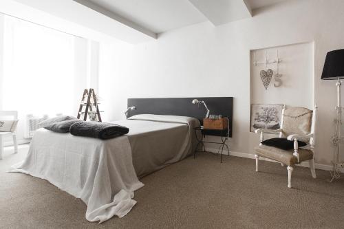 En eller flere senge i et værelse på Hotel Cervetta 5