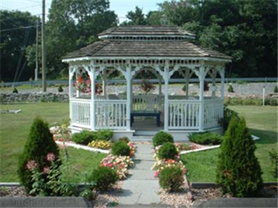 a gazebo in the middle of a park at Americas Best Value Inn - Stonington in Stonington