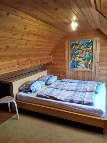 Llit o llits en una habitació de Laras Ferienhaus