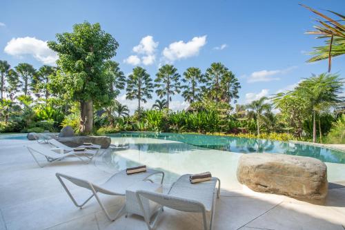 Bazén v ubytování Sanctoo Suites & Villas nebo v jeho okolí