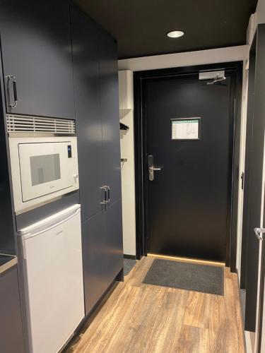 Η κουζίνα ή μικρή κουζίνα στο Magnolia House Sollentuna