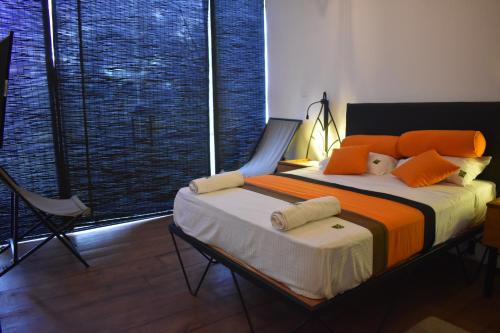 Una cama o camas en una habitación de Kakulanda Resort