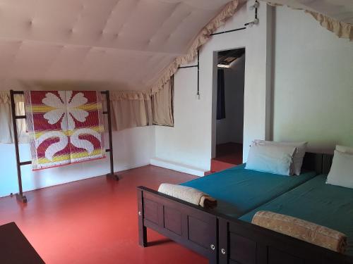 Ένα ή περισσότερα κρεβάτια σε δωμάτιο στο Tranquilandia