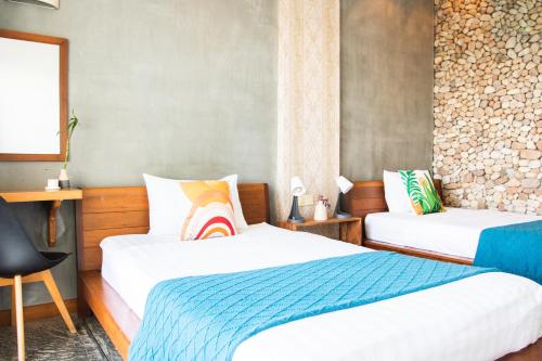 Cama o camas de una habitación en Saravoan-Kep Hotel