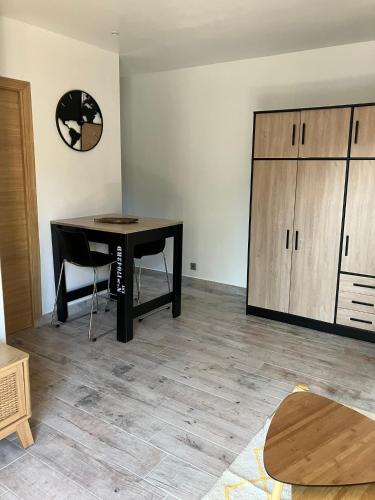a living room with a table and a cabinet at studio rocca in Sotta