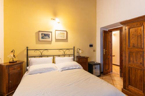 Кровать или кровати в номере Agriturismo Il Giglio