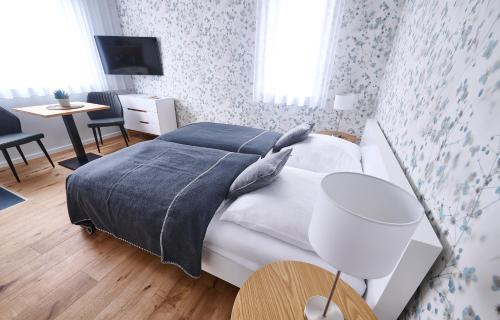 Postel nebo postele na pokoji v ubytování Bei Meyers - Zwenkauer See