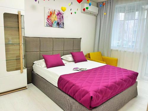 Un pat sau paturi într-o cameră la Tevi Apartments
