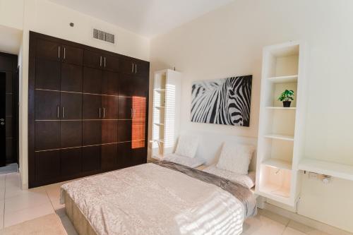 Fotografie z fotogalerie ubytování A Cosy one-bedroom apartment. v Dubaji