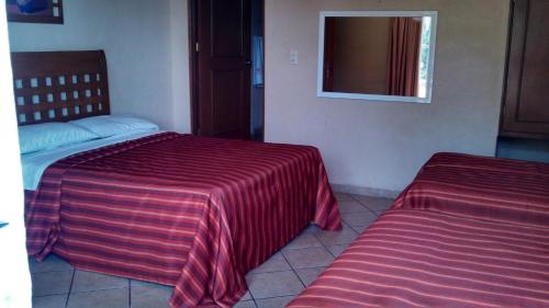 Katil atau katil-katil dalam bilik di Hotel Real Santa María