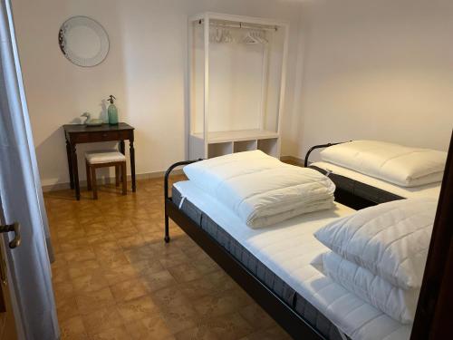 Posteľ alebo postele v izbe v ubytovaní B&B La Loccaia