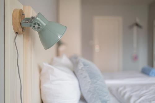 Hotel 'Das Strandhaus'にあるベッド
