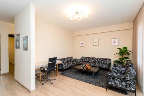 Χώρος καθιστικού στο Harmony Apartment II