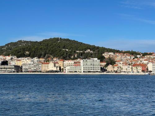 a city on the shore of a body of water at Hotel Ambasador in Split