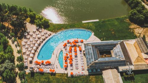 an aerial view of a resort with a swimming pool at Zaga Zaga Sat in Tecuci