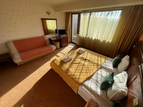 Katil atau katil-katil dalam bilik di HOTEL BOLYARI