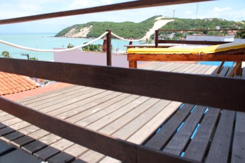 a view of the ocean from the deck of a boat at Encanto da Praia hotel pousada in Natal