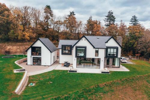 an aerial view of a house at The Loft Studio apartment - above detached new build garage in Llanymynech