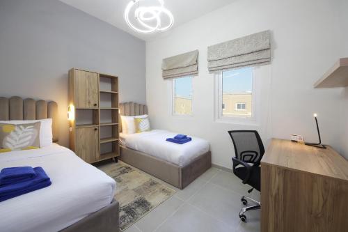 Postel nebo postele na pokoji v ubytování New Arabian Villa Nova