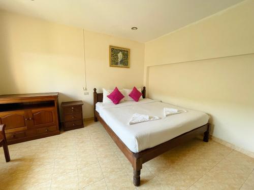 Ένα ή περισσότερα κρεβάτια σε δωμάτιο στο Meewaya Hotel