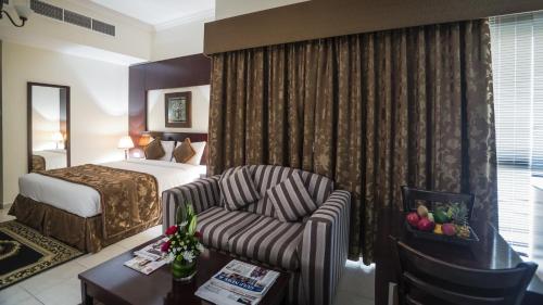  Arabian Dreams Hotel Apartments -  Room  picture :   Tea/Coffee maker    Bath    Safety deposit box                           