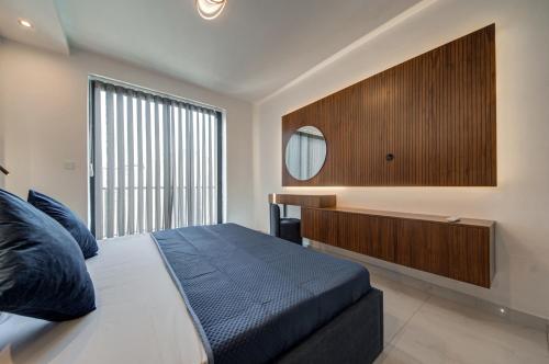 Katil atau katil-katil dalam bilik di Central Apartments