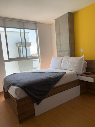 Ein Bett oder Betten in einem Zimmer der Unterkunft Ulivin Coliving