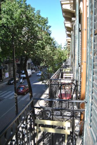 an apartment balcony with a view of a street at Balarm Hostel - Youth Hostel age limit 18-50 in Palermo