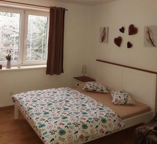 Ένα ή περισσότερα κρεβάτια σε δωμάτιο στο Apartmán JaFi Lipno nad Vltavou