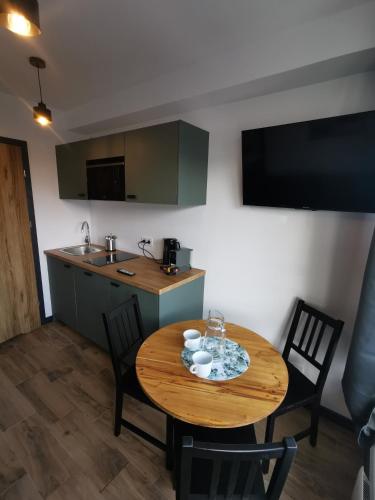 Kuchyň nebo kuchyňský kout v ubytování Apartamenty Piaskowe