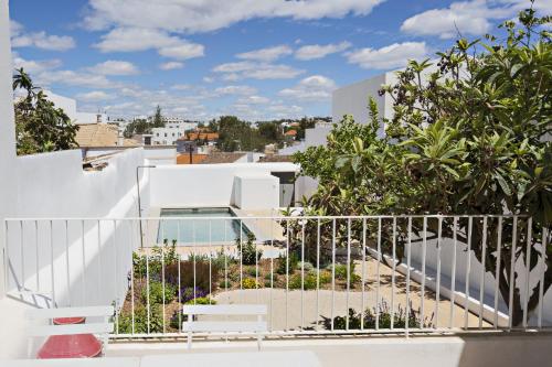 a view from the balcony of a house at Casa da Tavira in Tavira