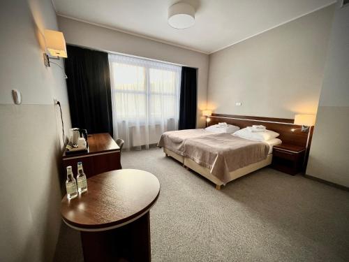 Postel nebo postele na pokoji v ubytování Hotel Szyndzielnia